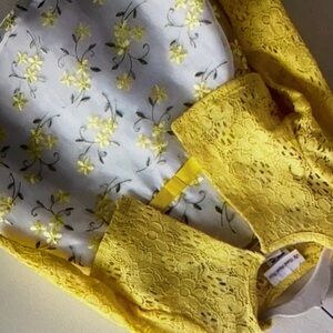 Features floral embroidery style blouse